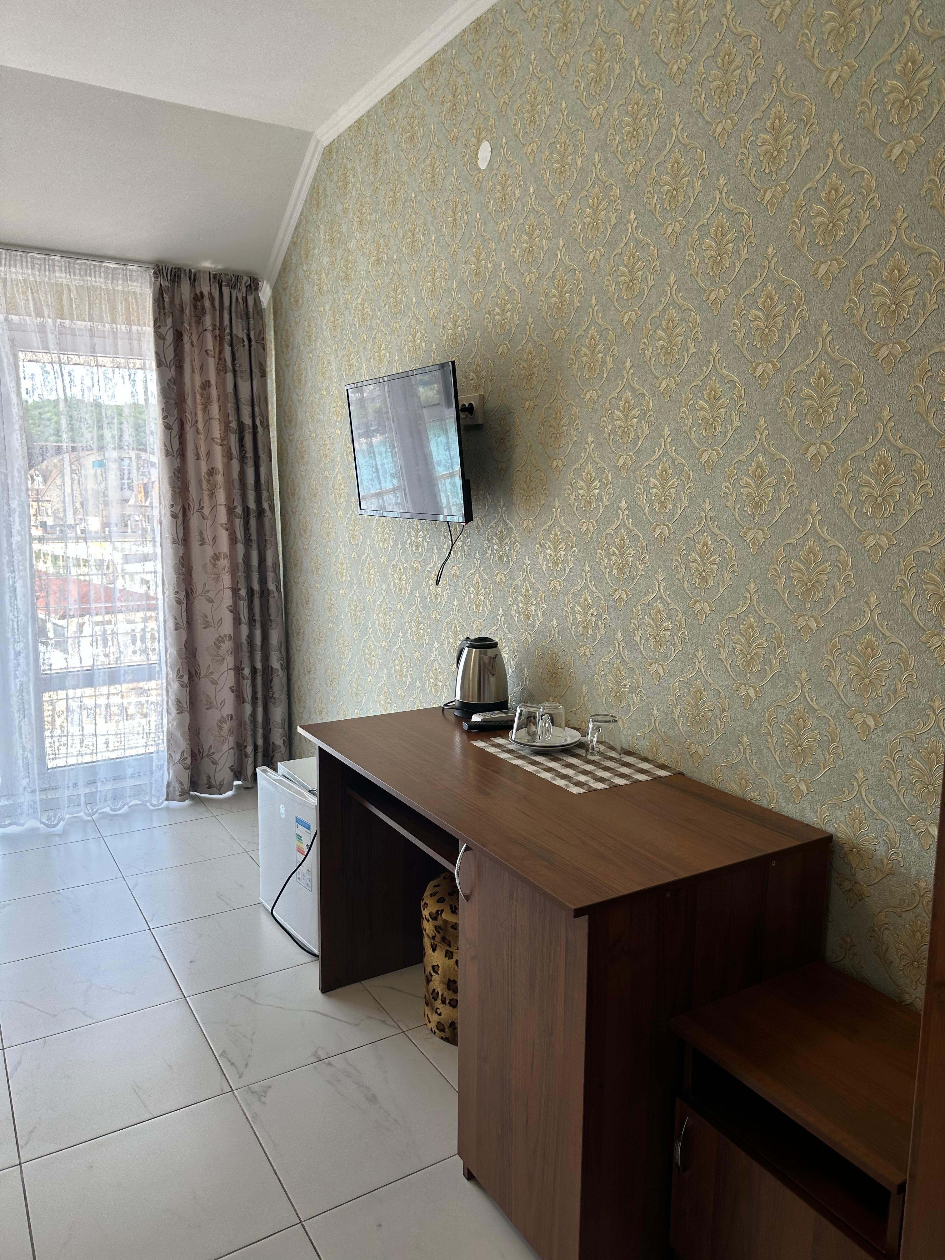 Трехместный номер с балконом