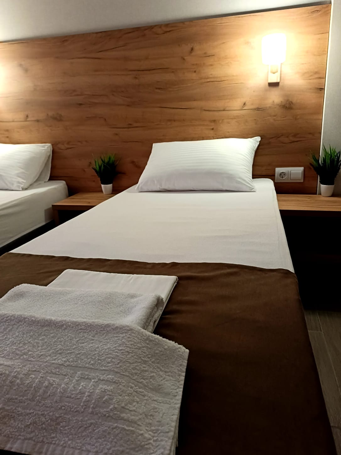 Четырехместный номер с выходом во двор