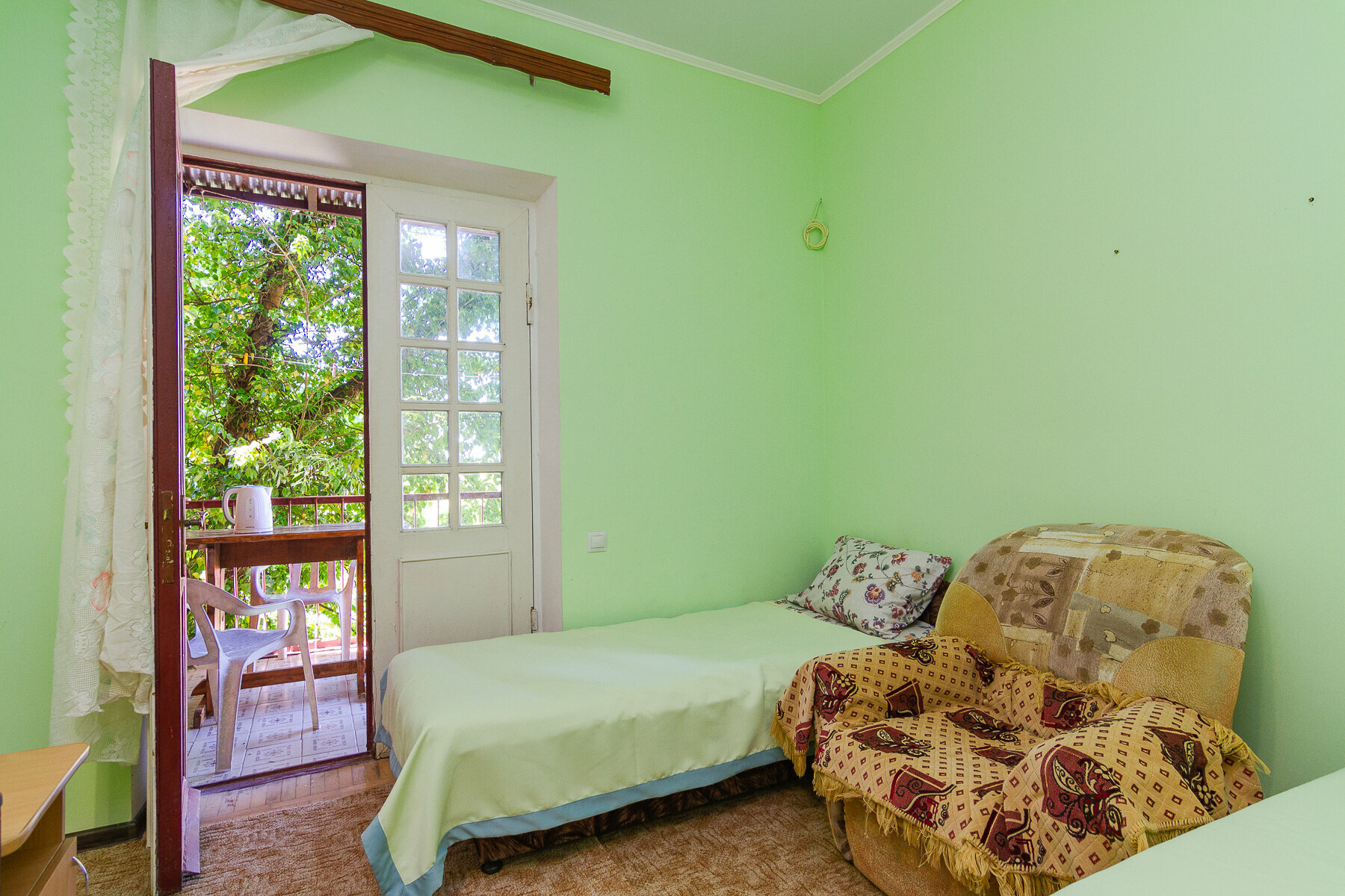 Трехместный номер с балконом