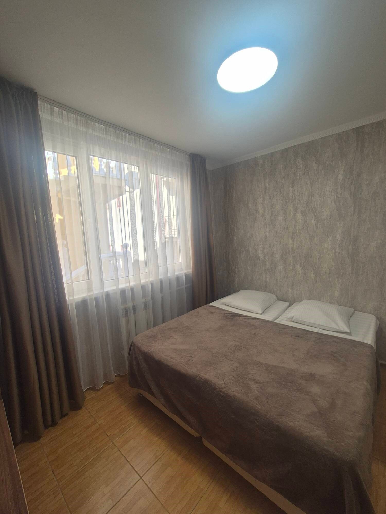 Четырехместный номер с балконом