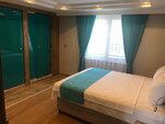Семейный двухместный номер с 1 двуспальной кроватью в Akcay Mas Palmiye Otel