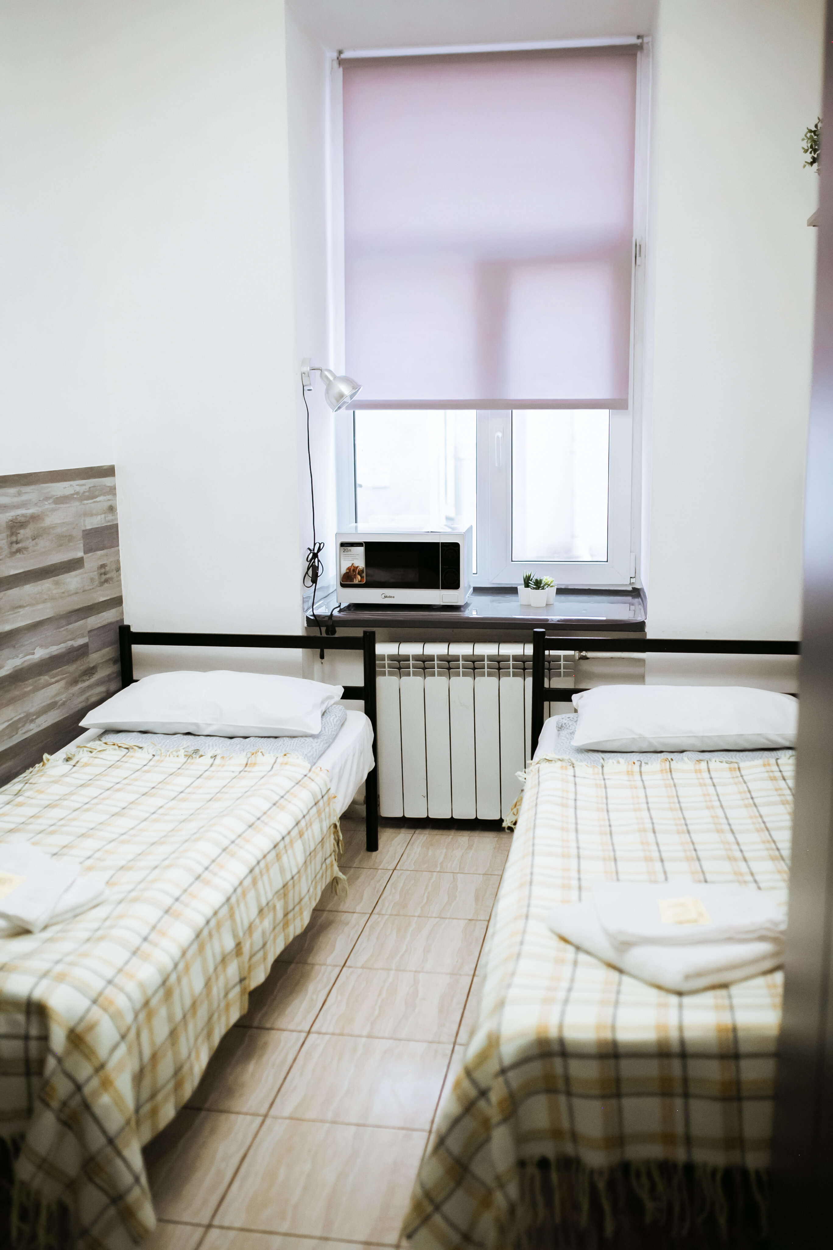 Двухместный номер с 2 отдельными кроватями и душем