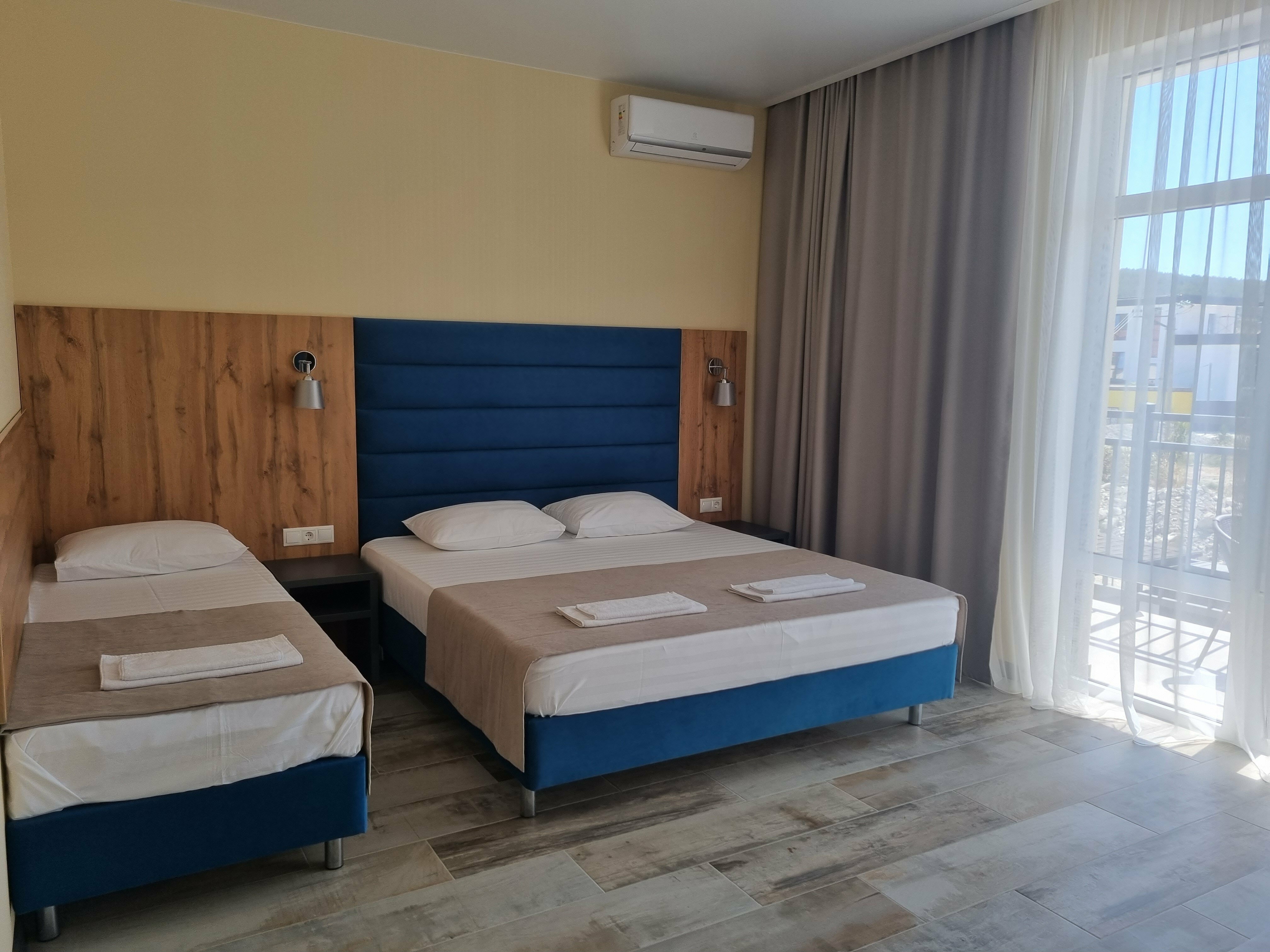 Улучшенный трехместный номер