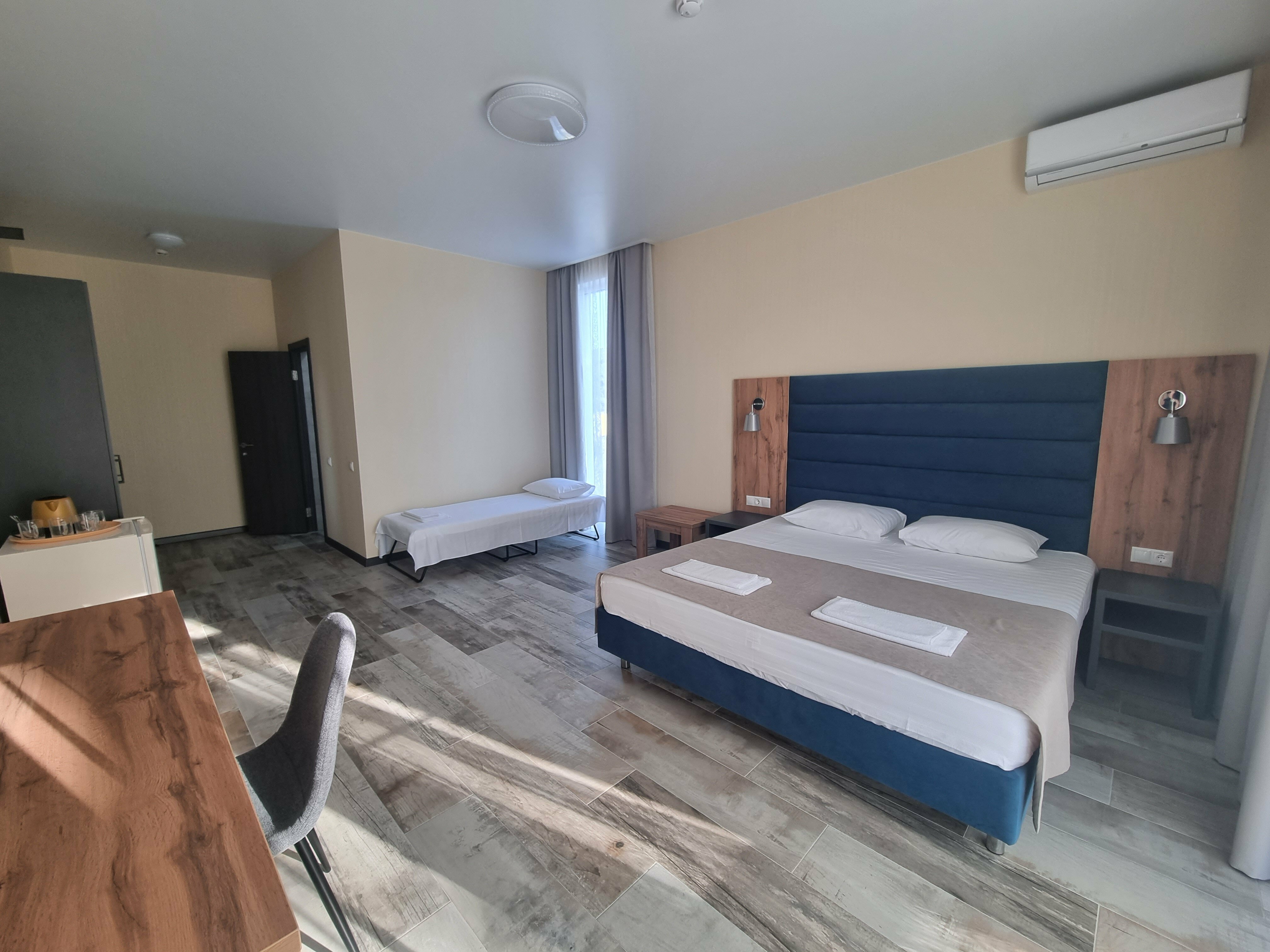 Улучшенный четырехместный номер