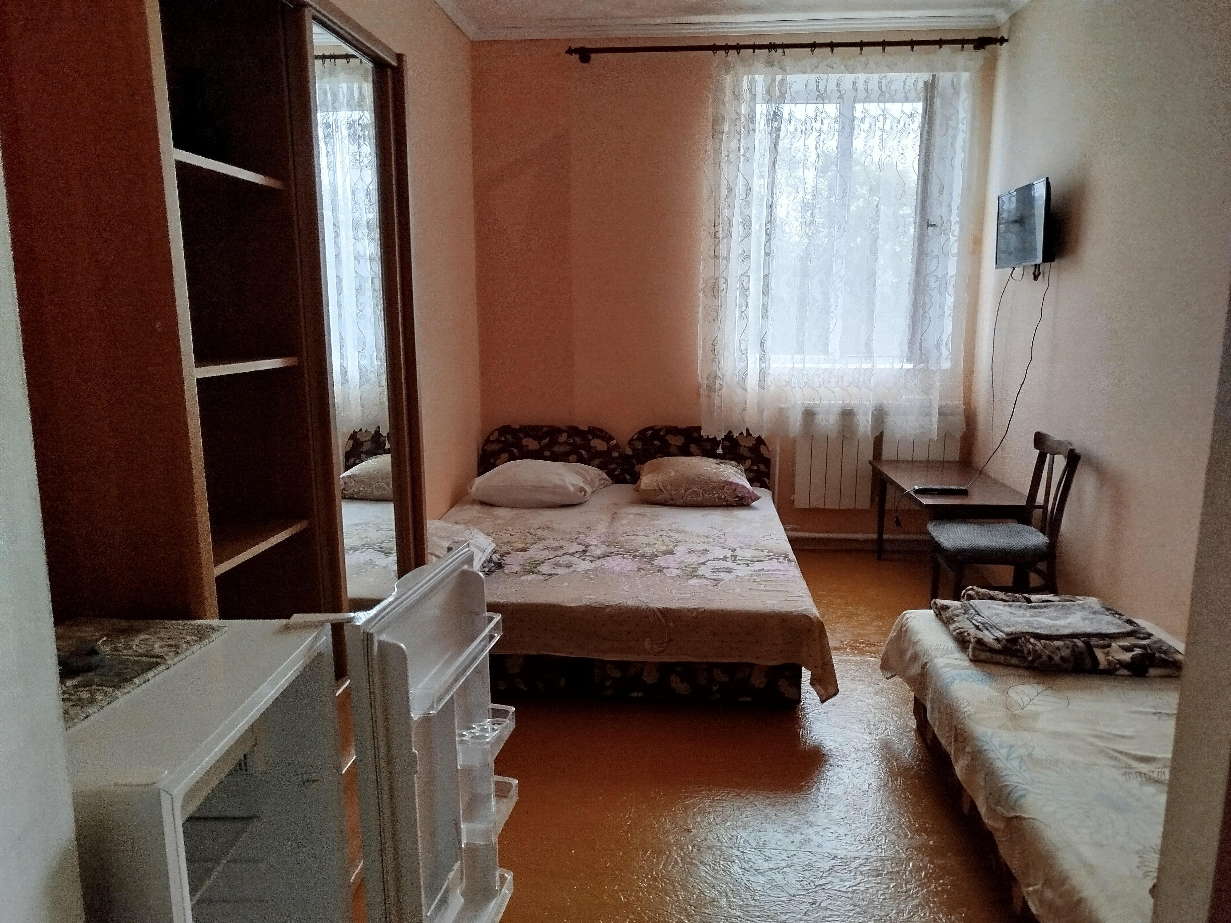 Трехместный номер с видом на сад