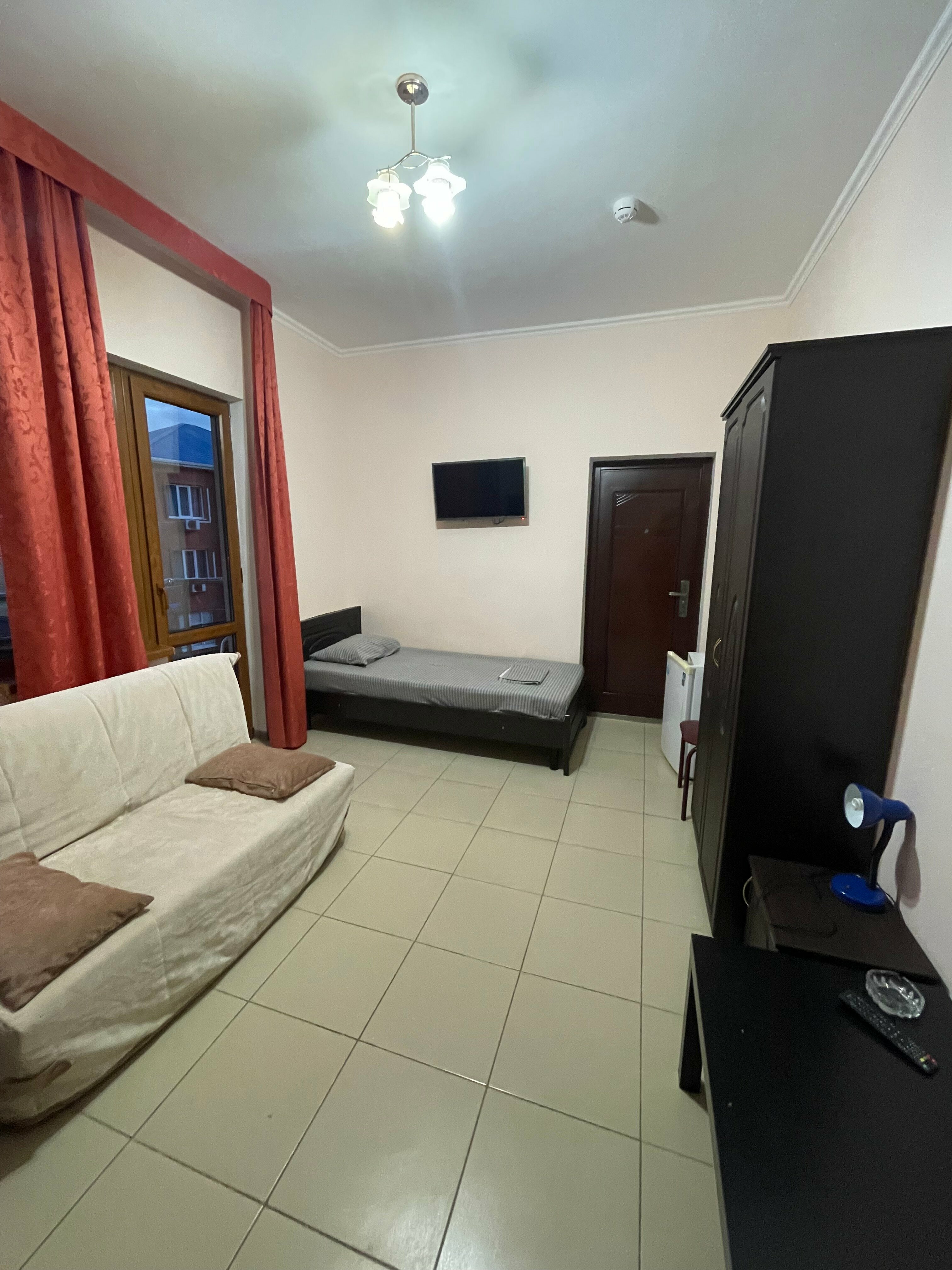 Трехместный номер с балконом