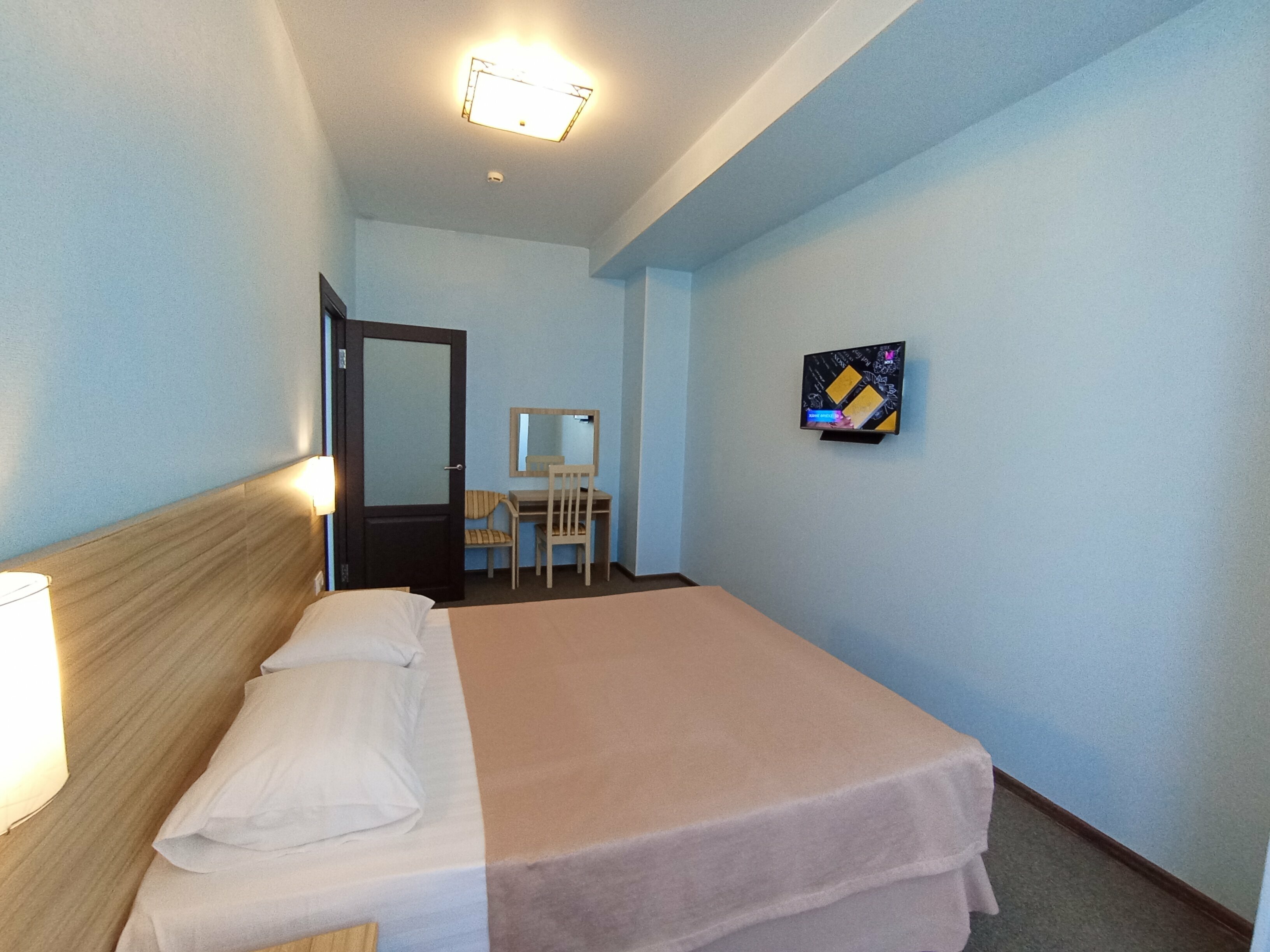 Четырехместный номер Делюкс