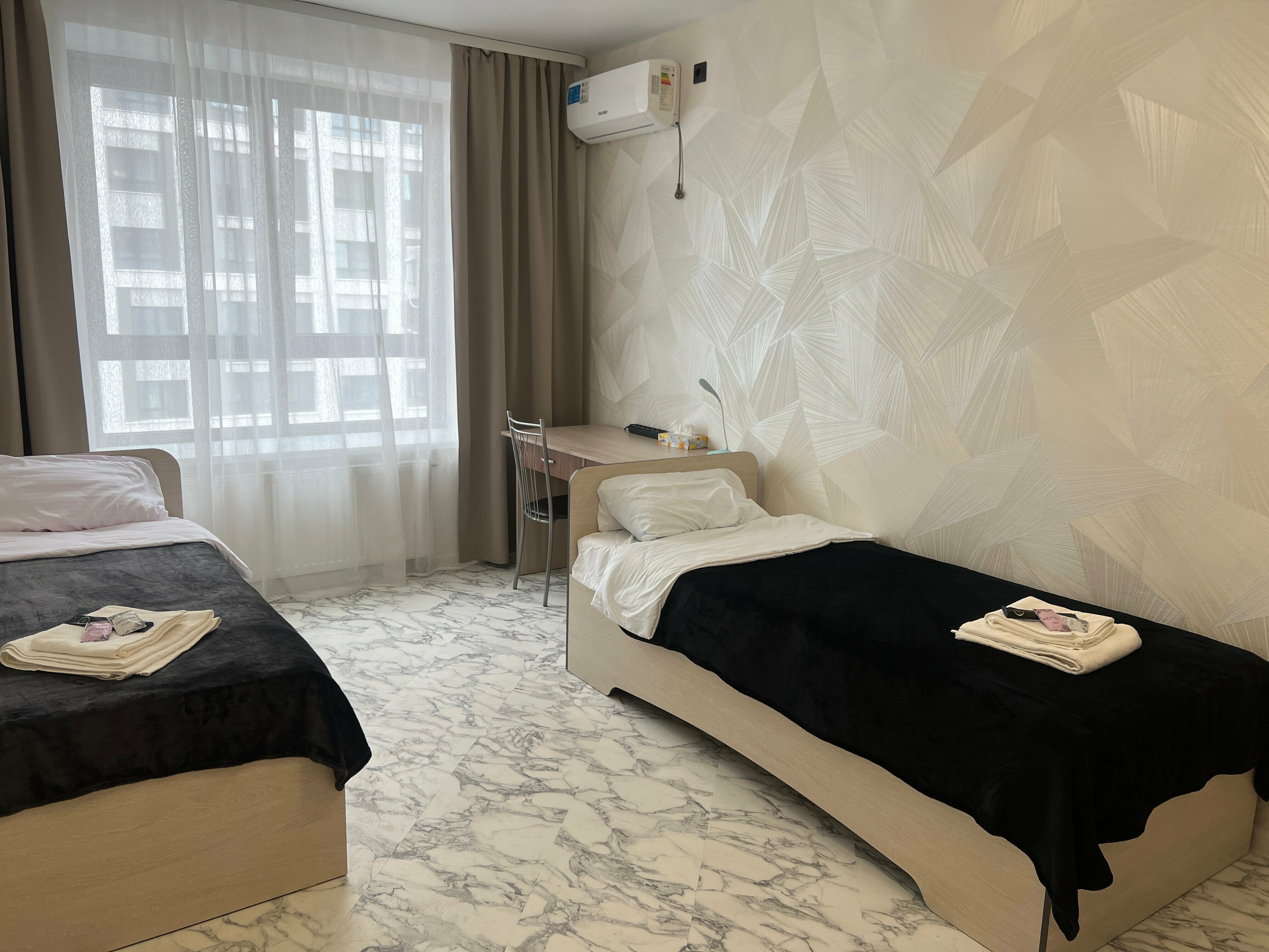 Четырехместный номер Делюкс