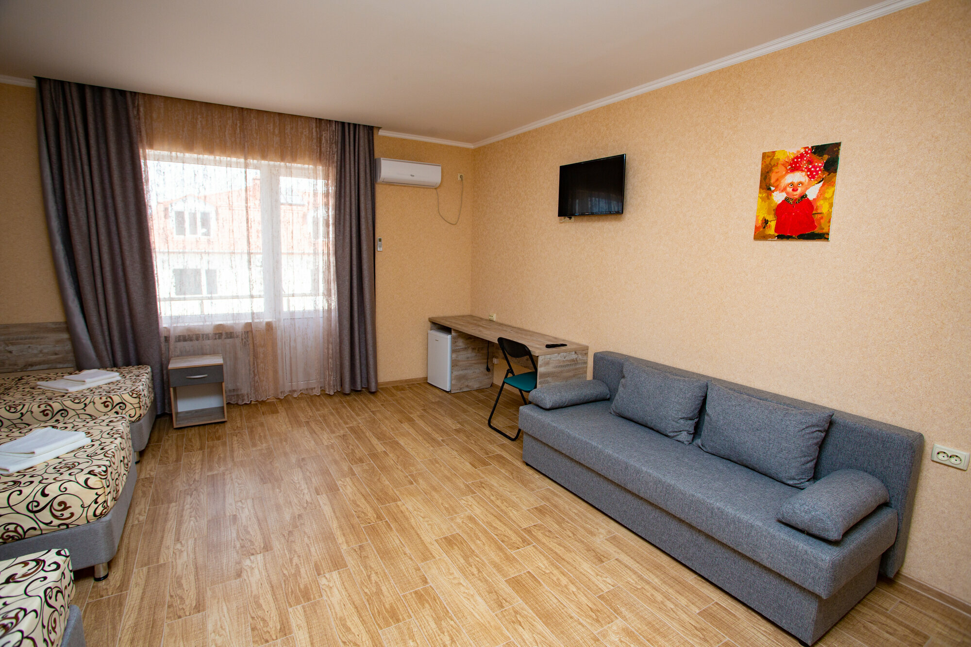 Трехместный номер Делюкс