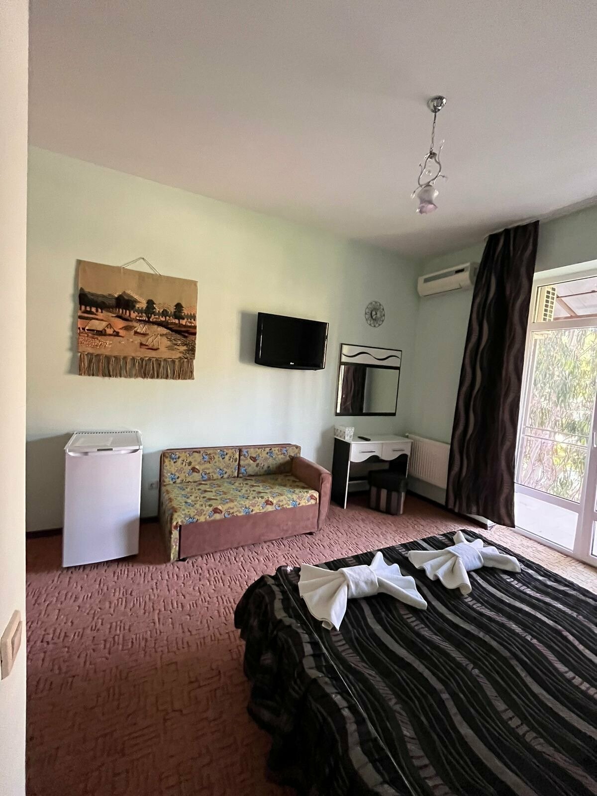 Трехместный номер Делюкс