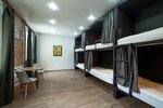 Кровать в общем 6-местном номере для мужчин и женщин в Pro loft