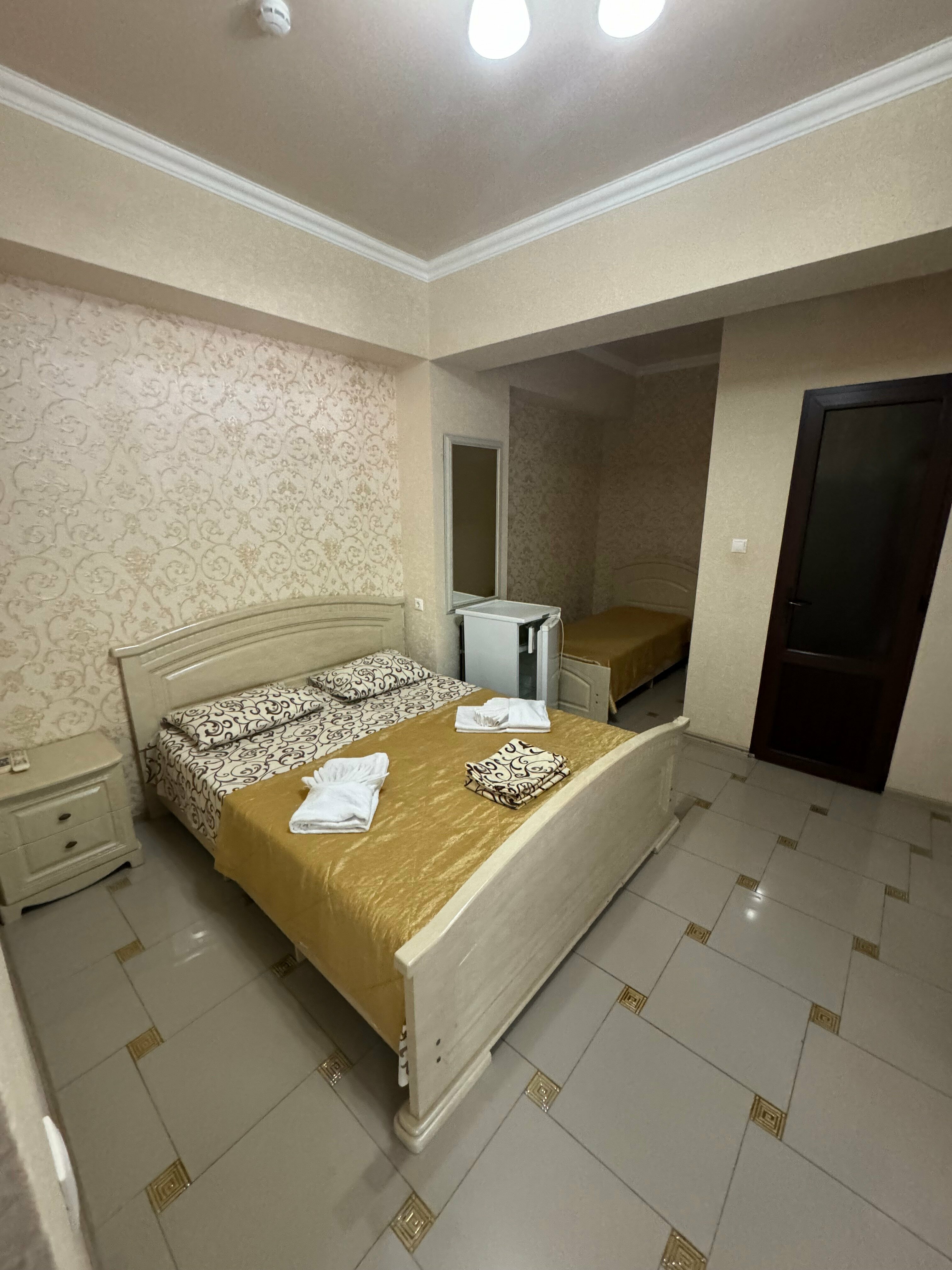 Трехместный номер Делюкс