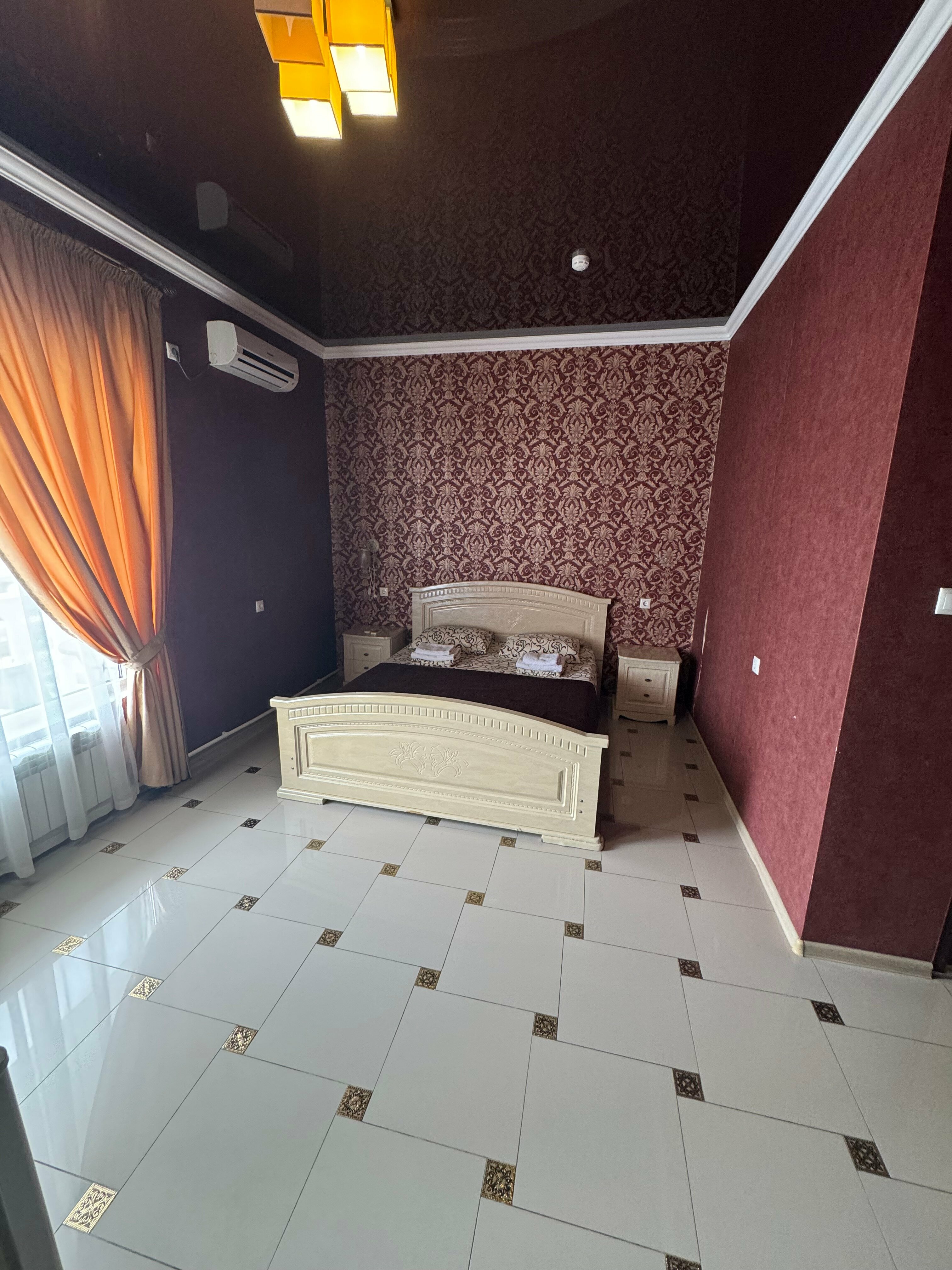 Трехместный номер Делюкс