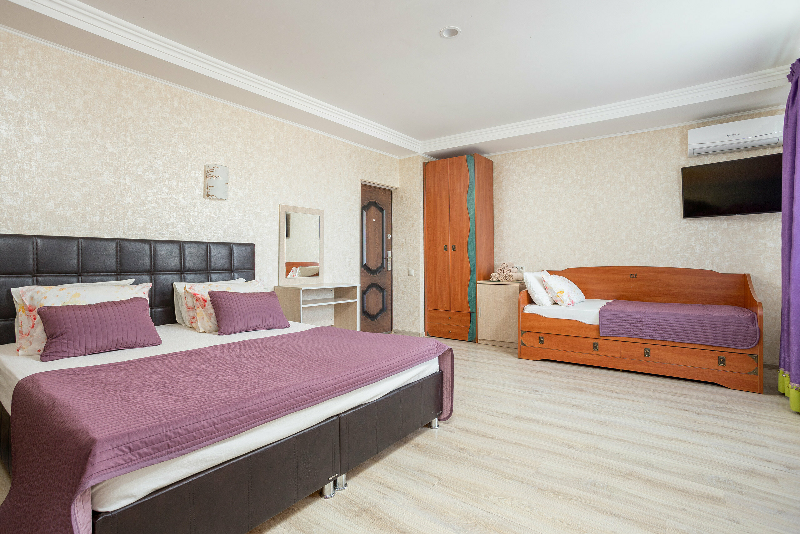 Трехместный номер с балконом