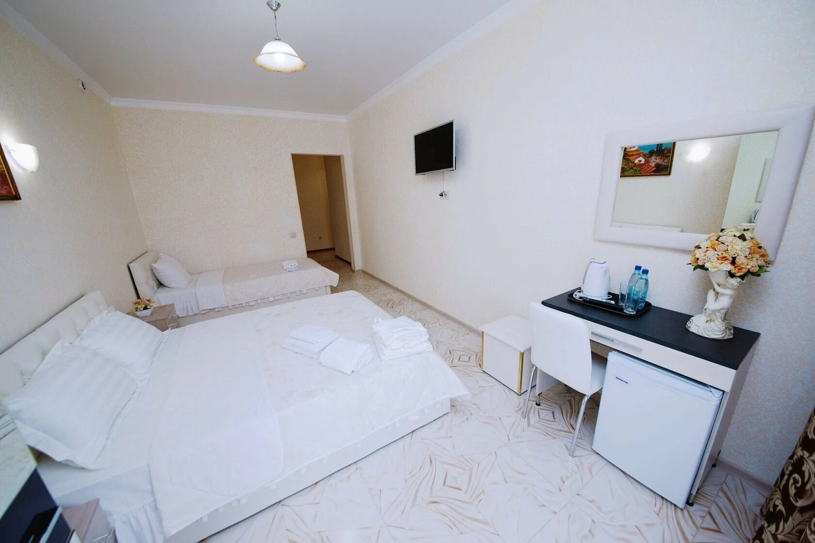 Трехместный номер с балконом