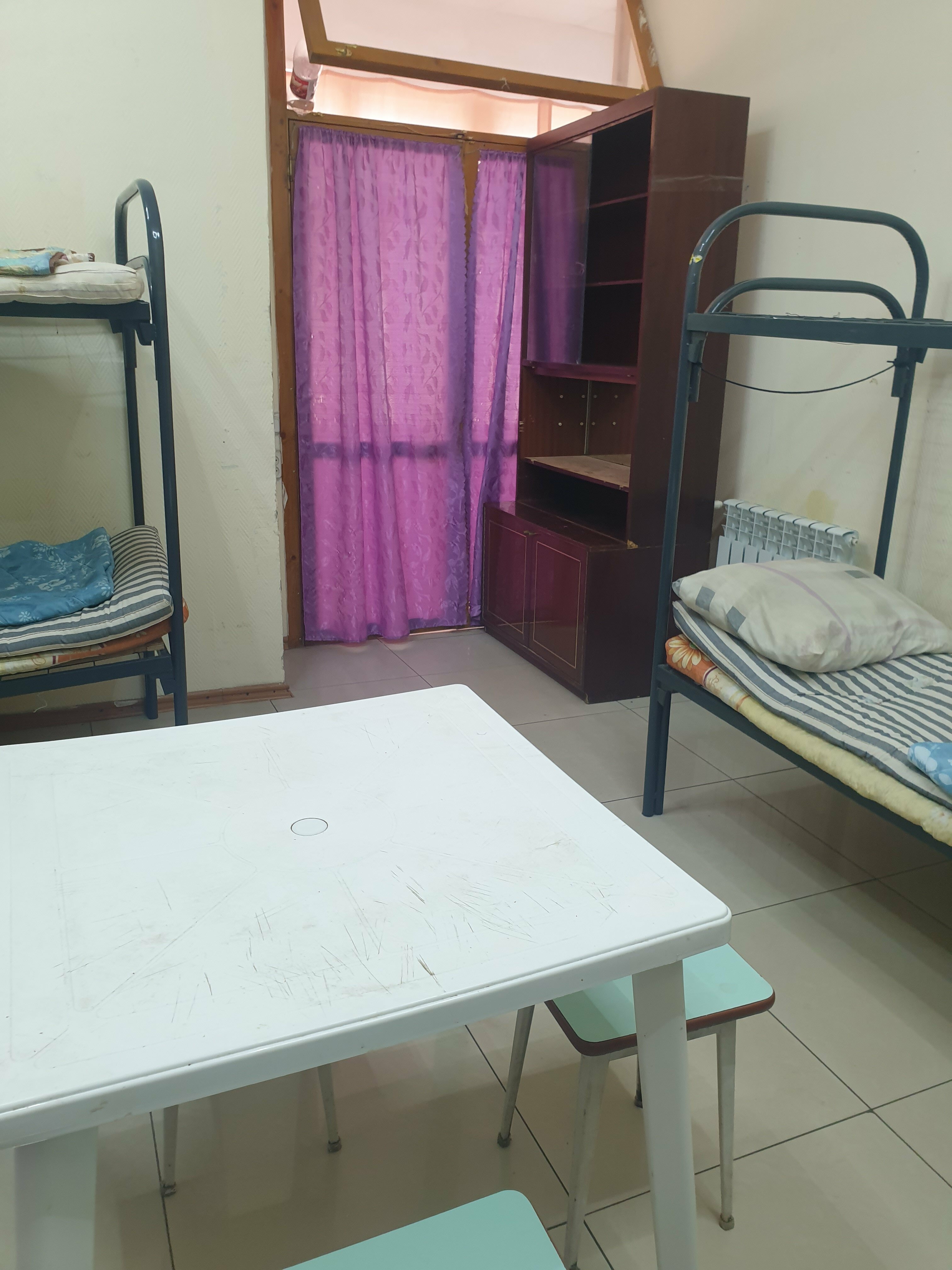 Общий 8-местный номер для мужчин