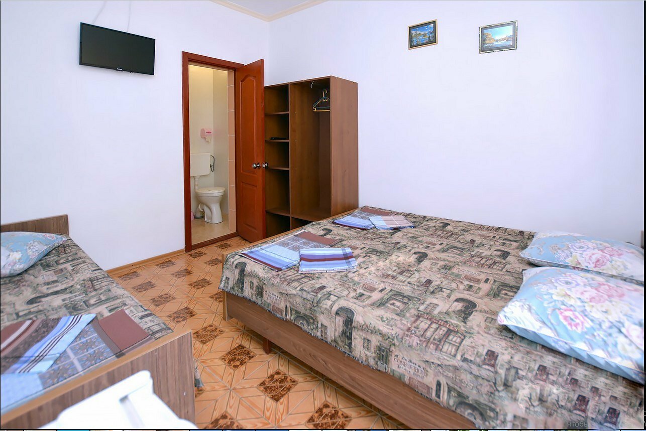 Трехместный номер с видом на город