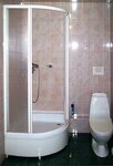 Номер люкс семейный с 2 двуспальными кроватями в Гвоздика