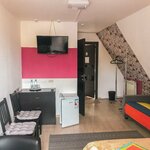 Номер стандарт с 1 двуспальной кроватью и диваном (мансарда) в Палитра