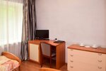 Номер стандарт с 2 односпальными кроватями (с завтраком) в Ермак