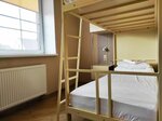 Кровать в общем женском номере с 4-мя двухъярусными кроватями (удобства общие) (мансарда) в Tapiau