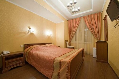 Номер стандарт с 1 двуспальной кроватью в На Дворянской
