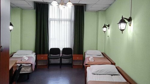 Кровать в 3-местном общем женском номере в Smart Hotel КДО Ладожский