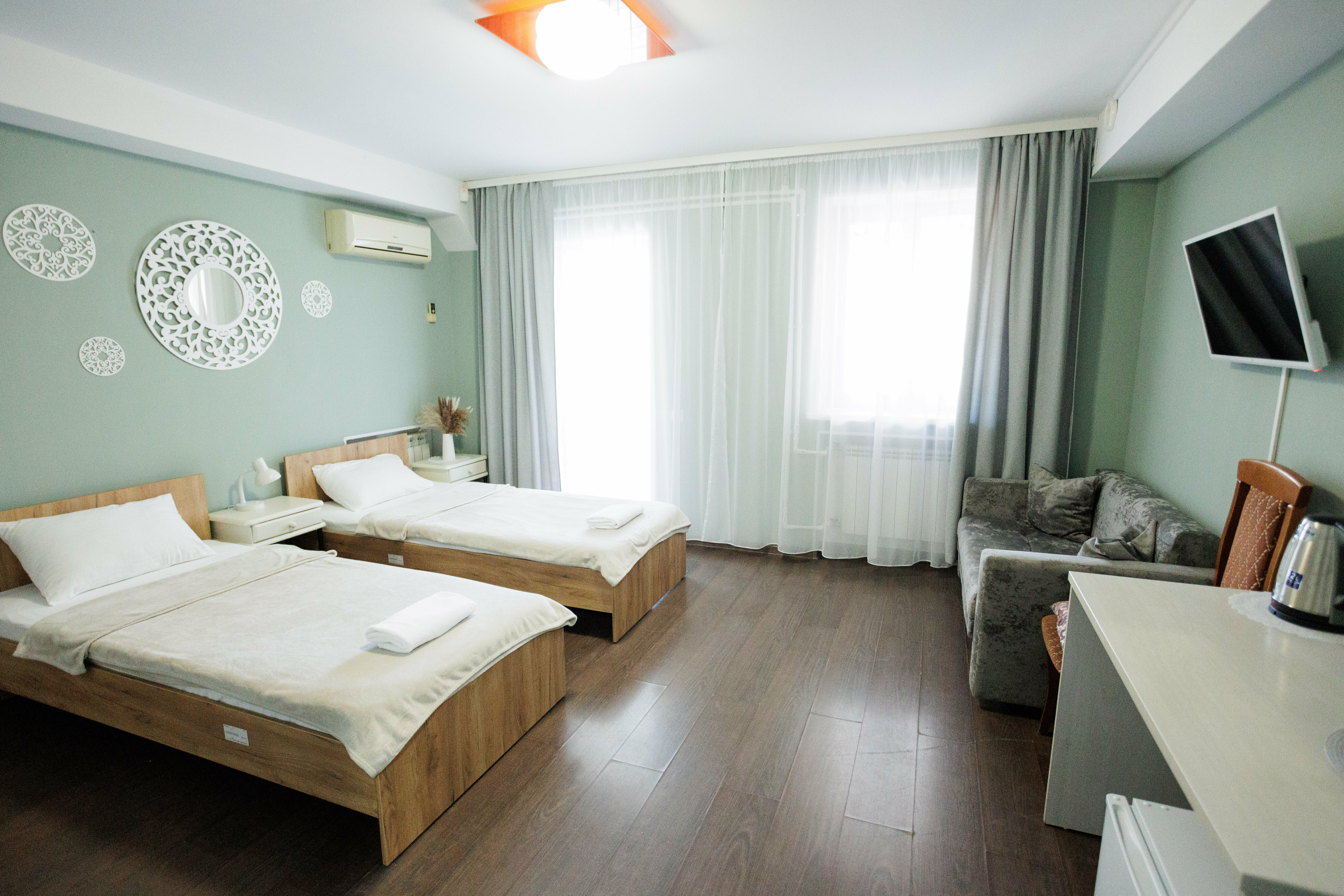 Двухместный номер с 2 отдельными кроватями и балконом