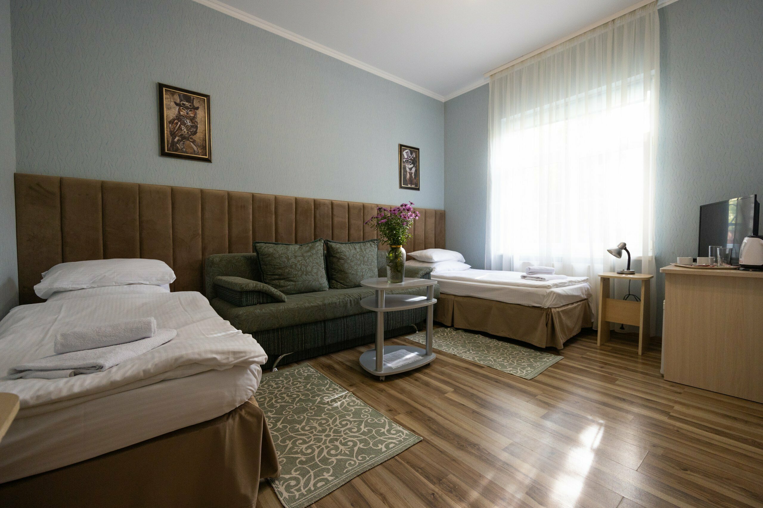 Улучшенное двухместное размещение +доп.место ( 2 отдельные кровати+диван)