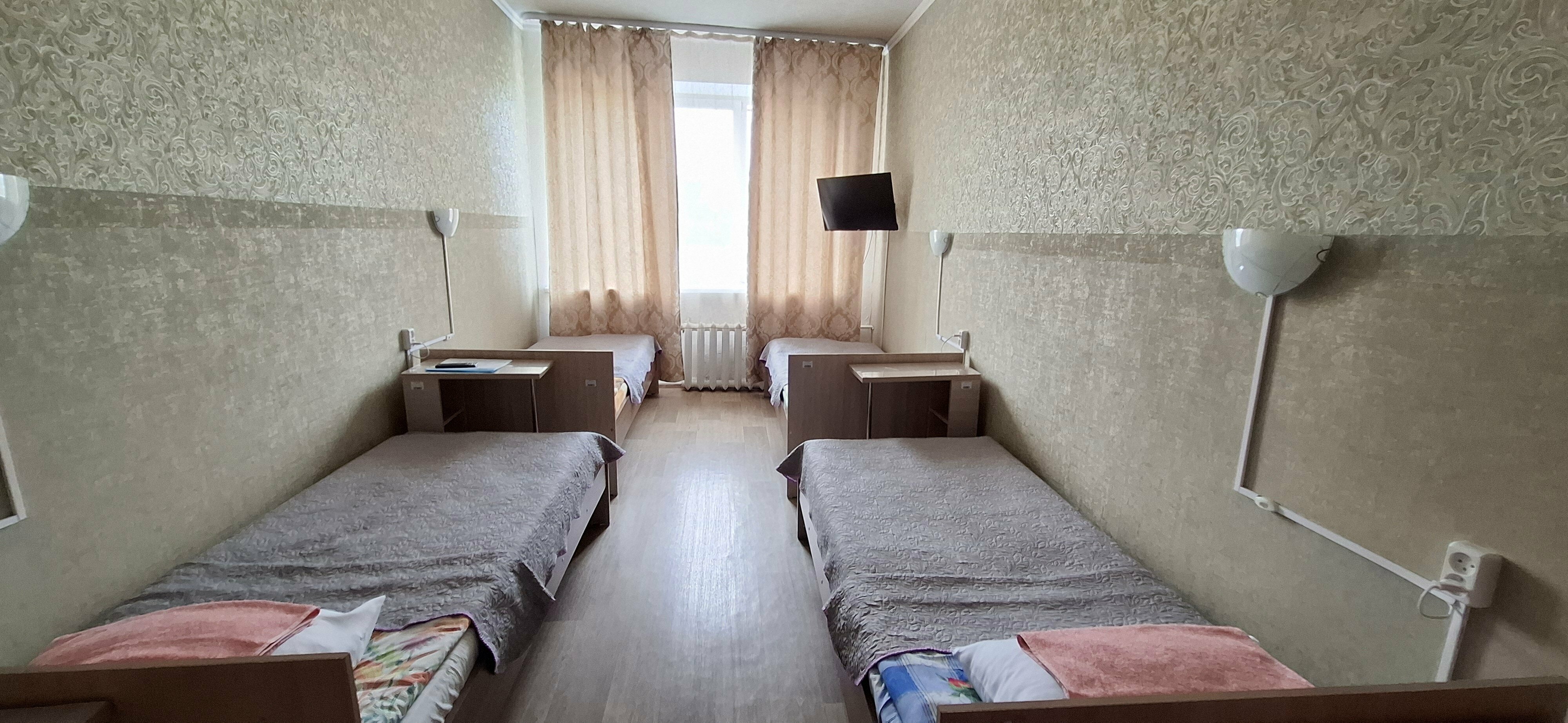 Кровать в общем номере с 4 кроватями