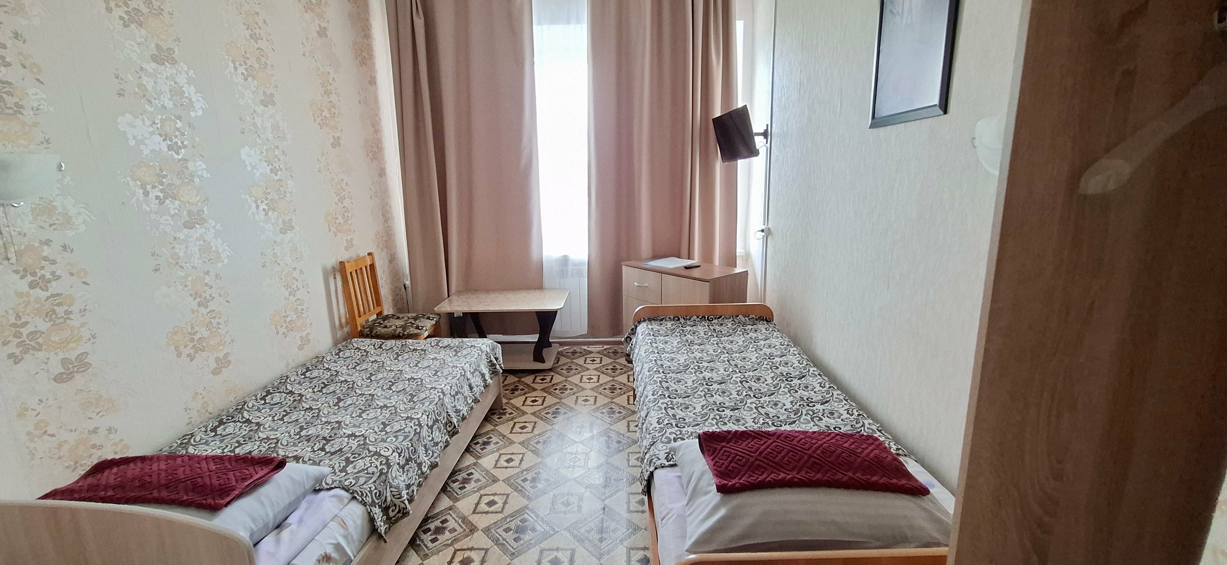 Кровать в общем номере с 4 кроватями