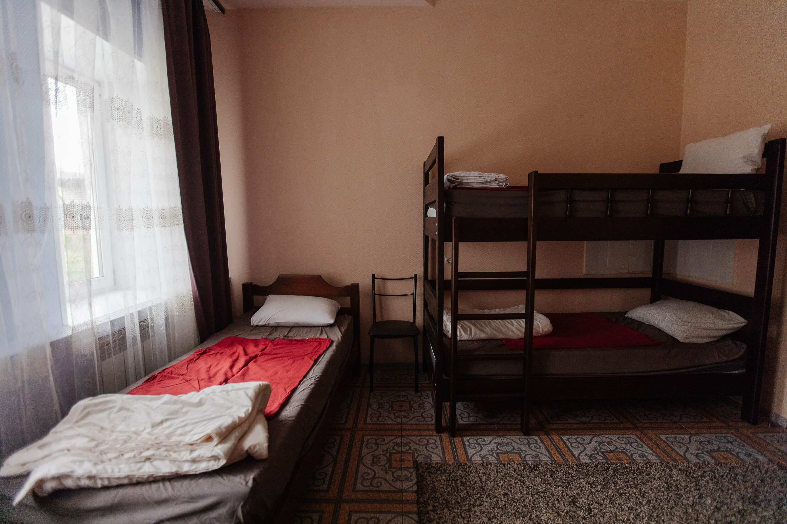 Кровать в общем 4-местном номере для мужчин и женщин