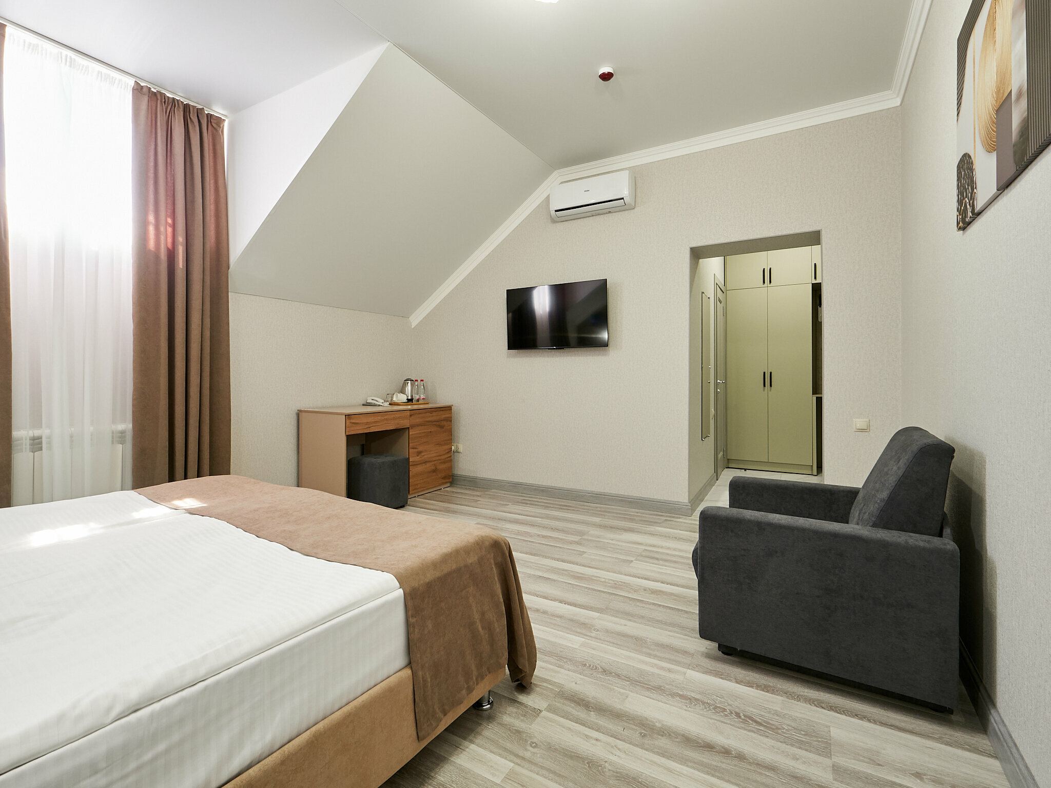 Трехместный номер Делюкс