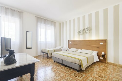 Четырехместный номер «Комфорт» в B&b VIA Stazione