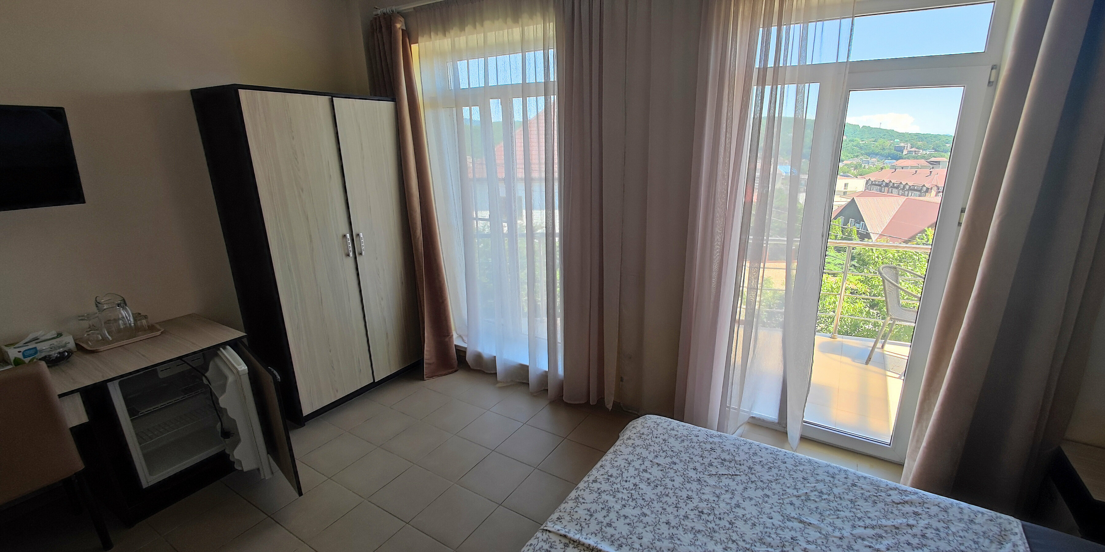 Трехместный номер с балконом