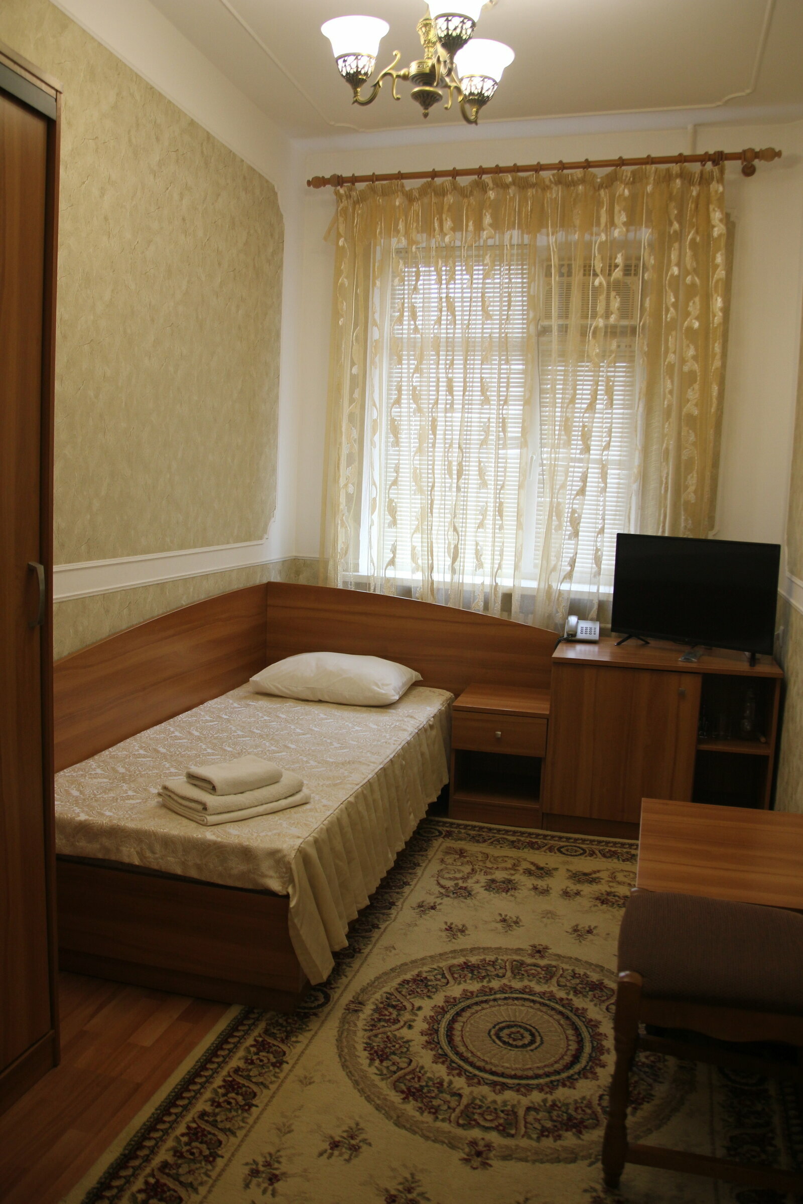 Просторный двухместный номер с 2 отдельными кроватями