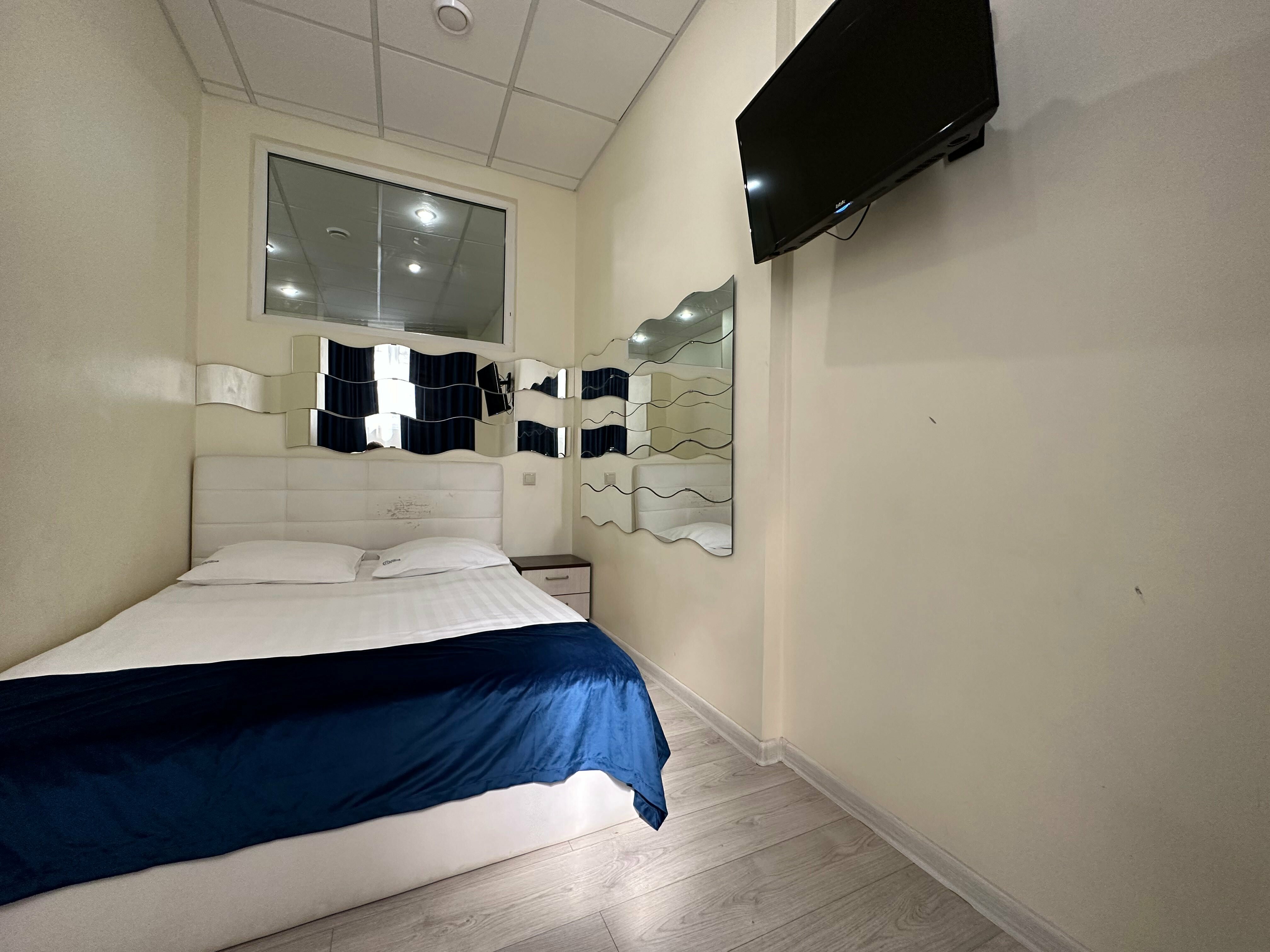 Трехместный номер Делюкс