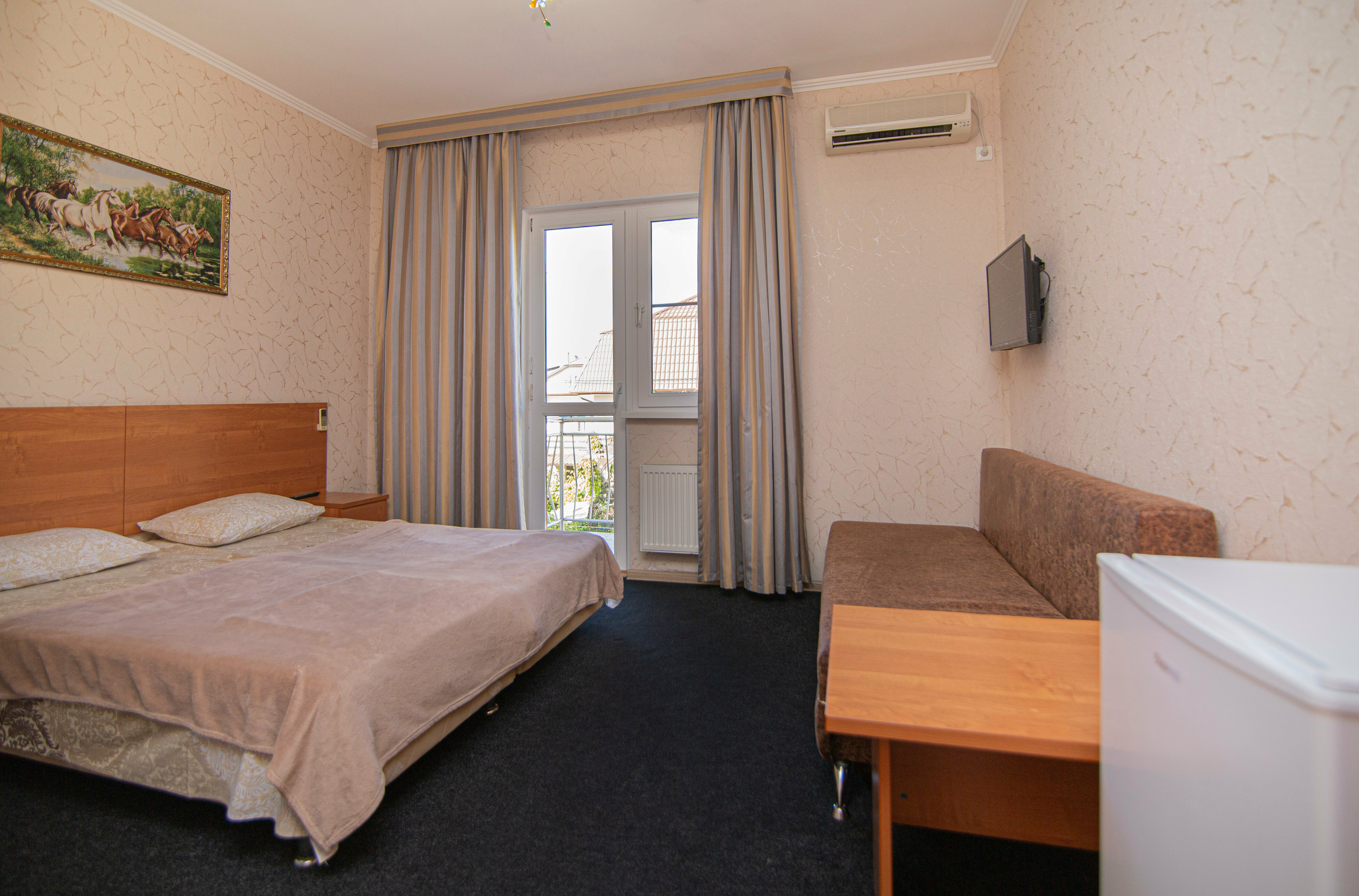 Четырехместный номер с балконом