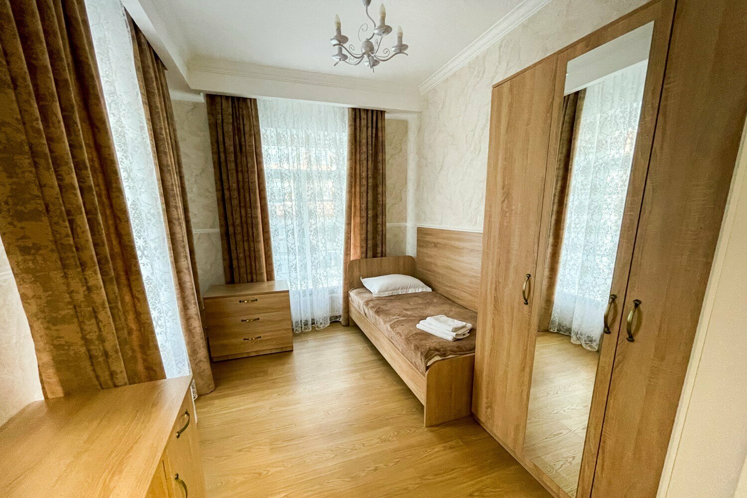 Одноместный номер с общим душем и туалетом