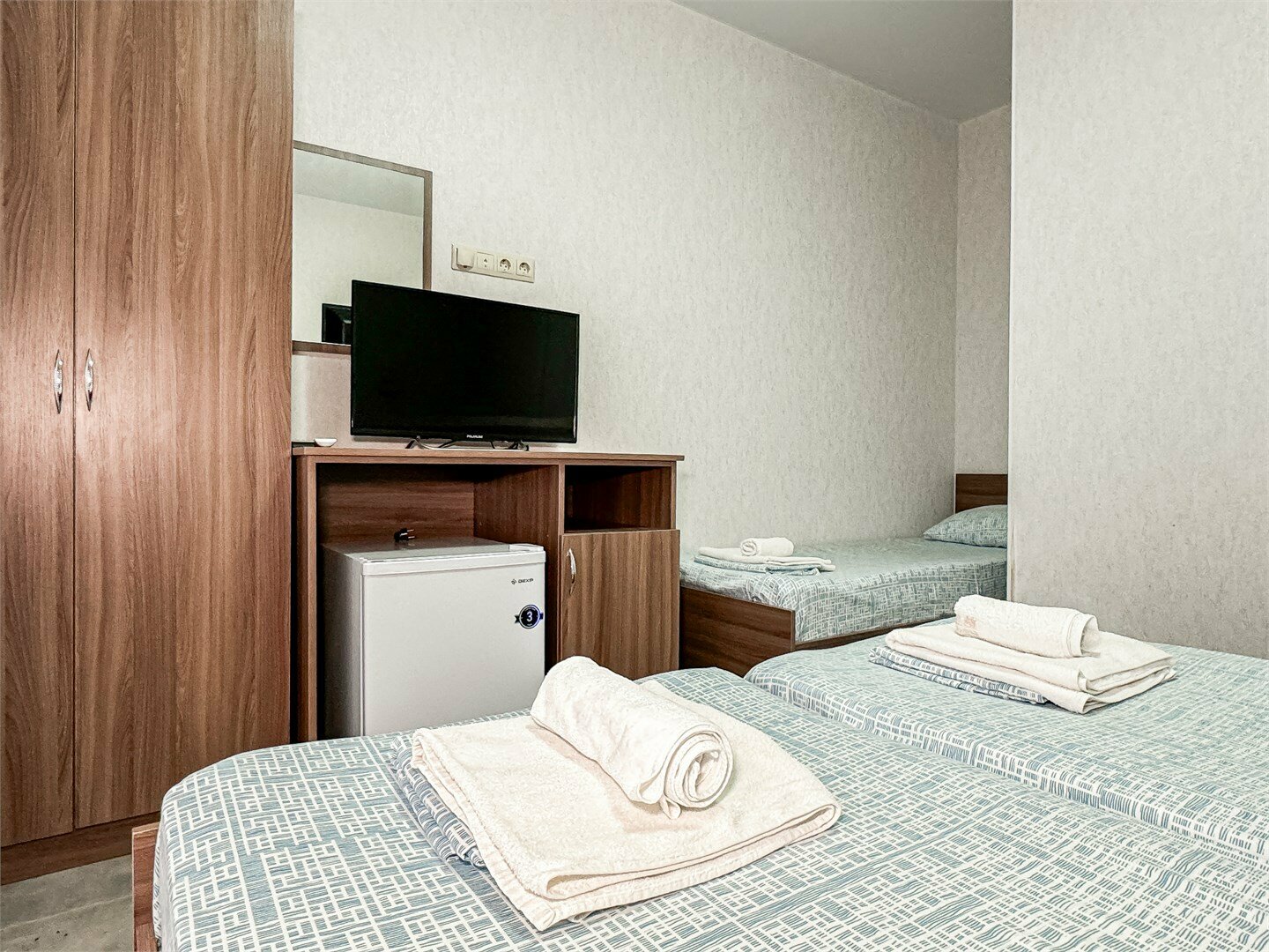 Трехместный номер с основными удобствами