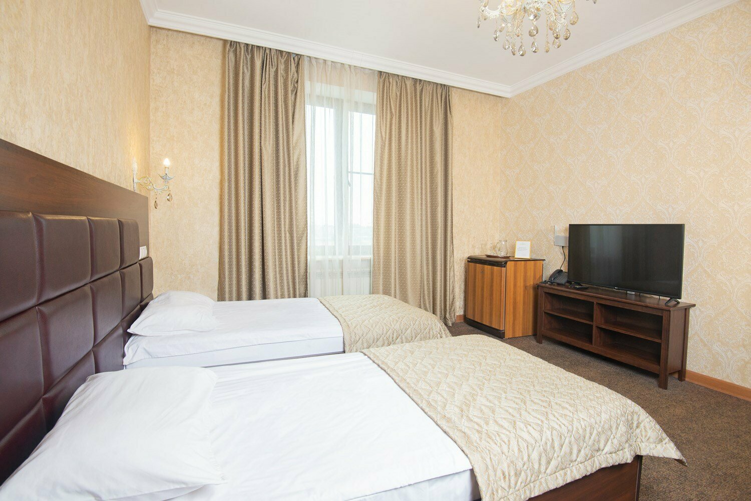 Улучшенный номер с  2 односпальными кроватями № 211