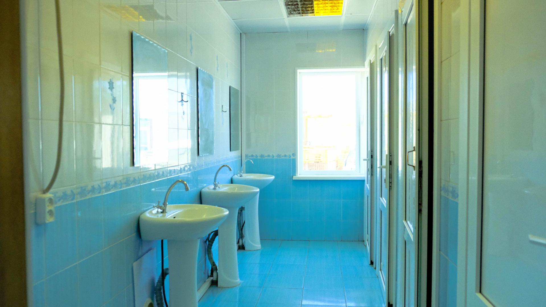 Четырехместный номер с общей ванной комнатой