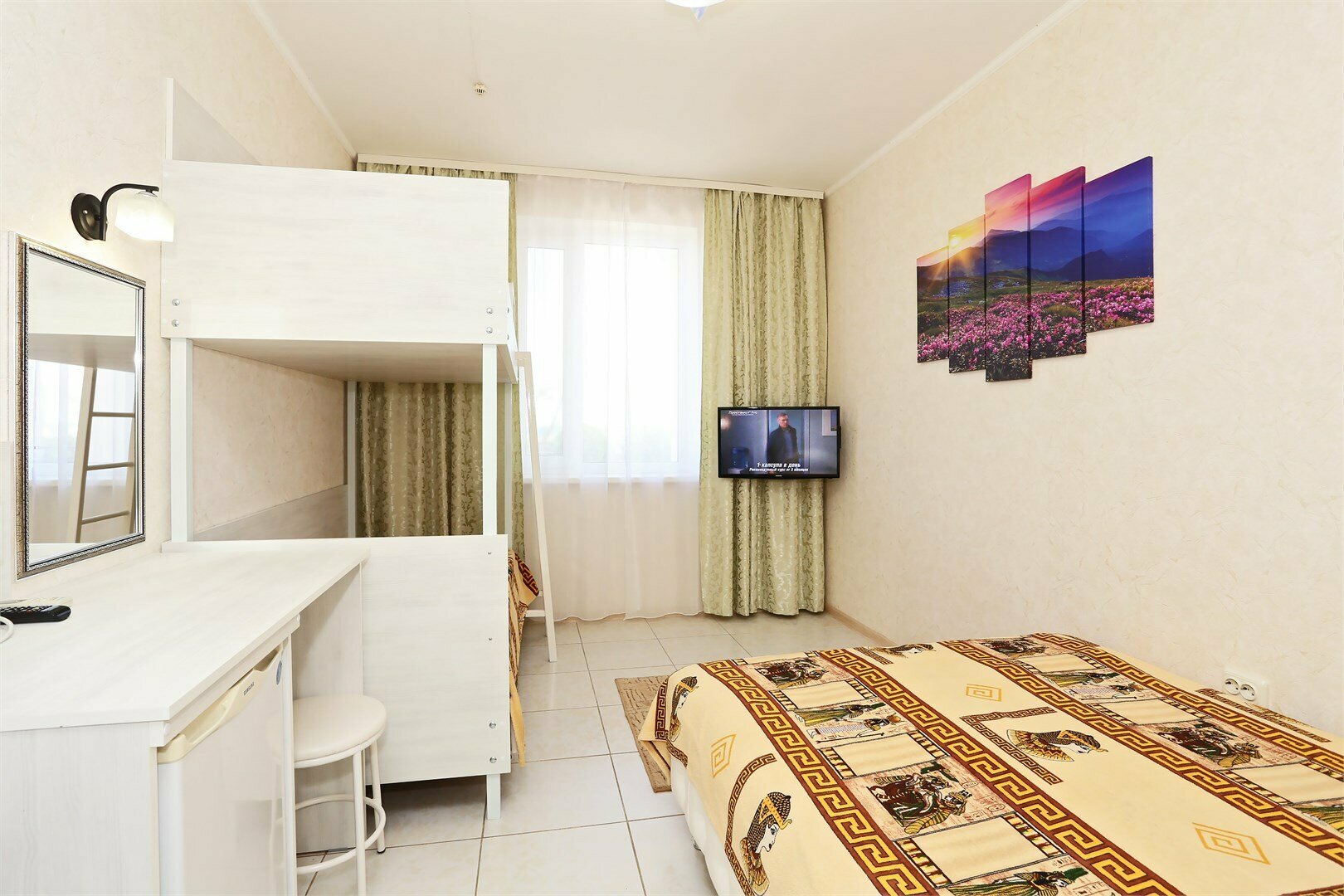 Четырехместный номер Делюкс