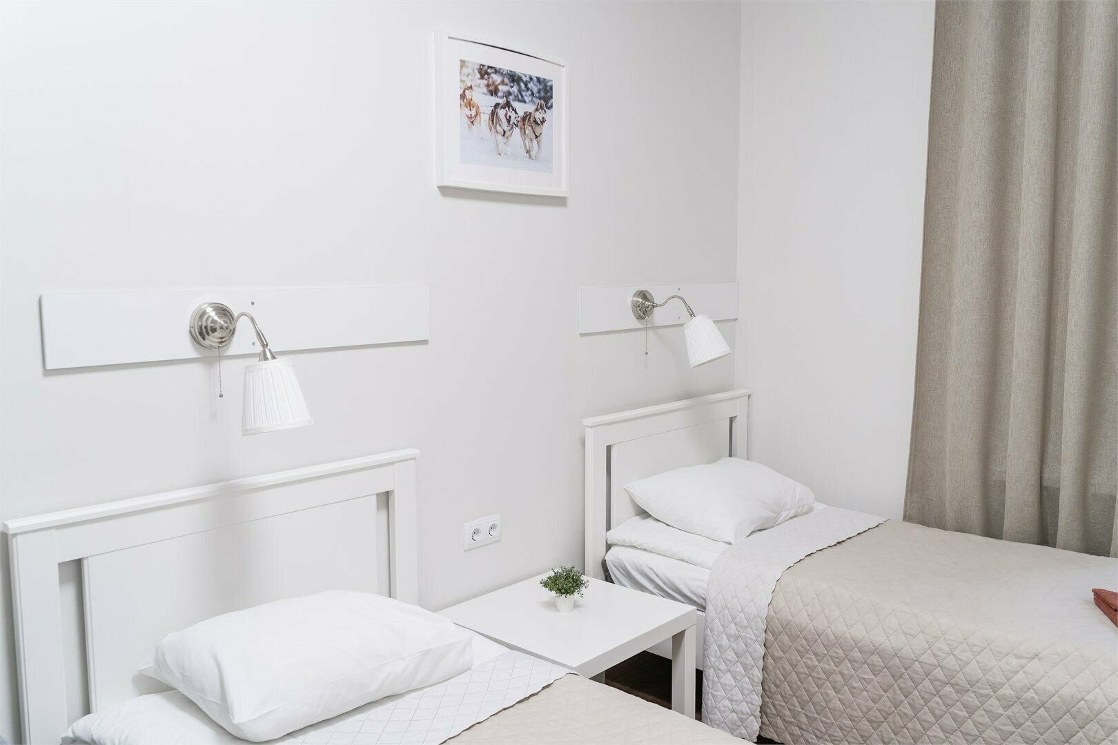 Двухместный номер с 2 отдельными кроватями и общей ванной комнатой