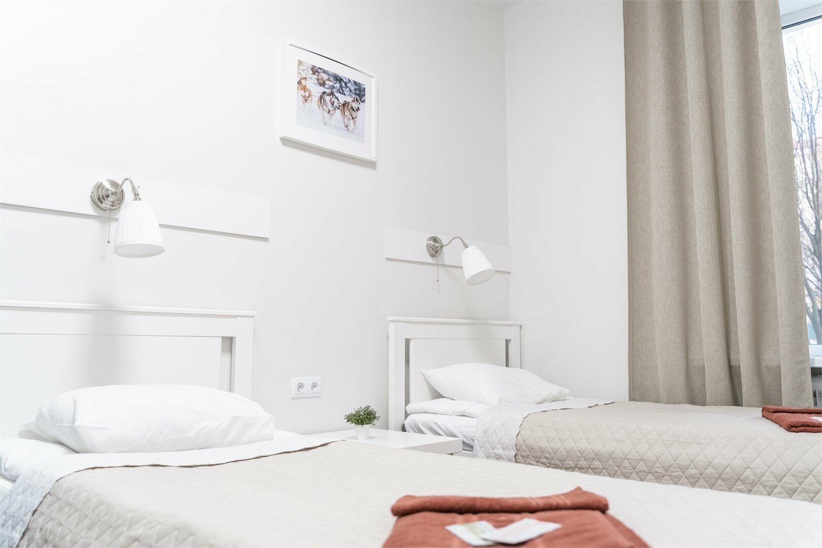 Двухместный номер с 2 отдельными кроватями и общей ванной комнатой