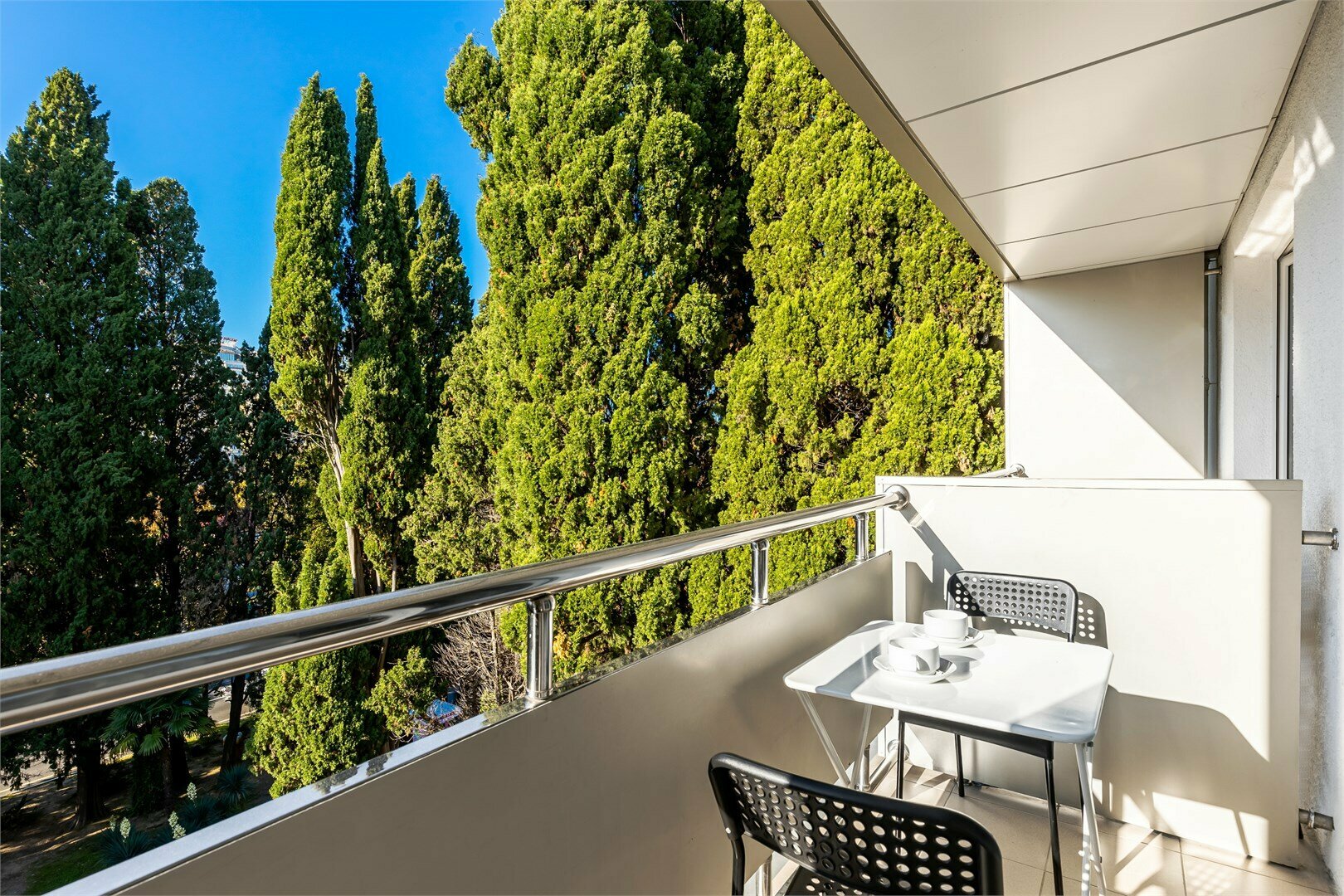 Трехместный номер с балконом и общими удобствами на этаже