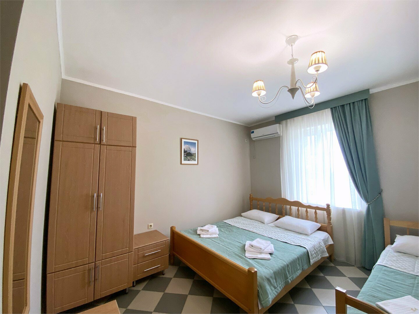 Улучшенный трехместный номер