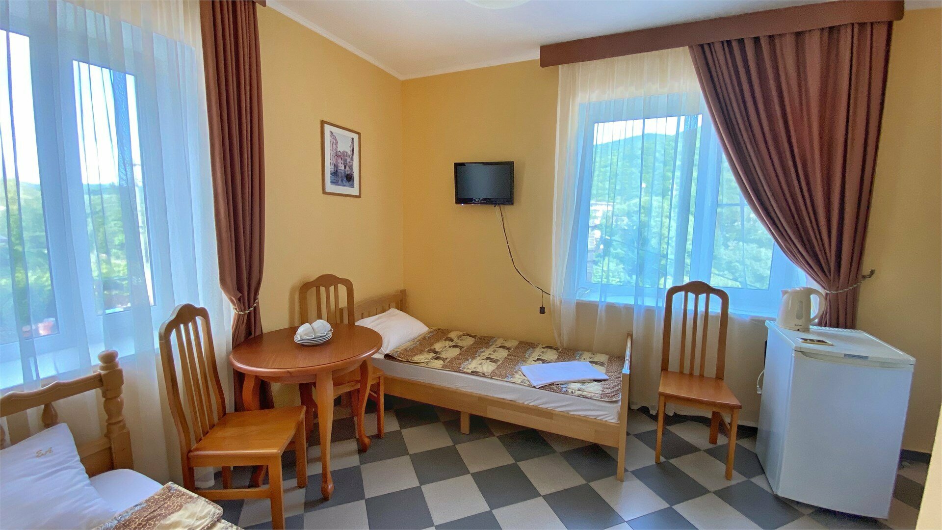 Улучшенный трехместный номер