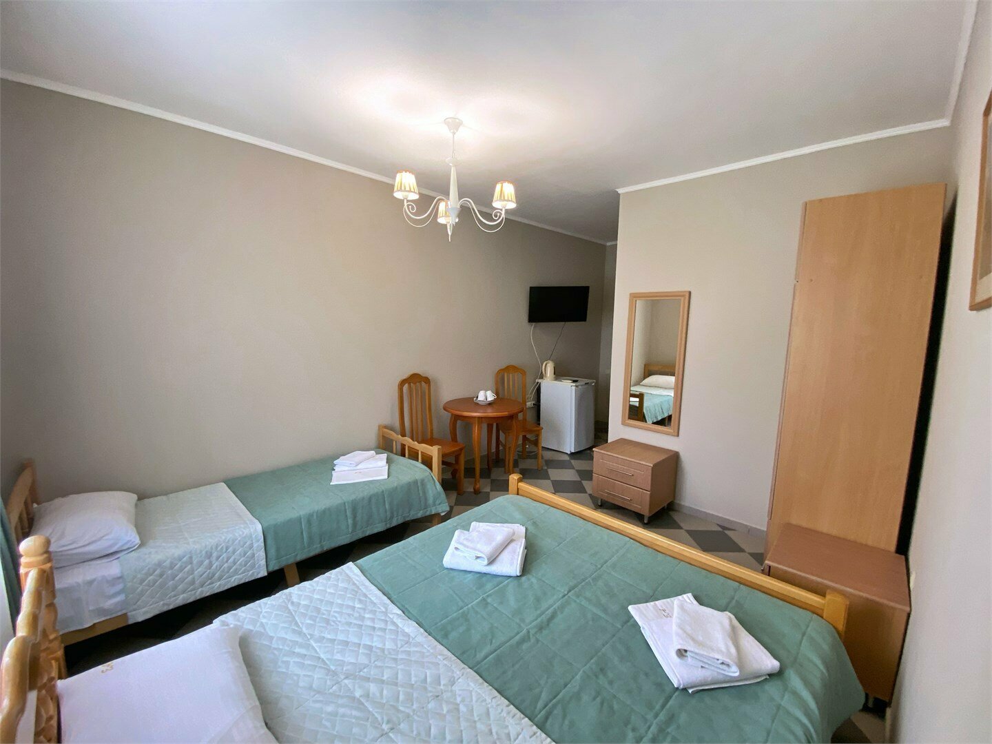 Улучшенный трехместный номер