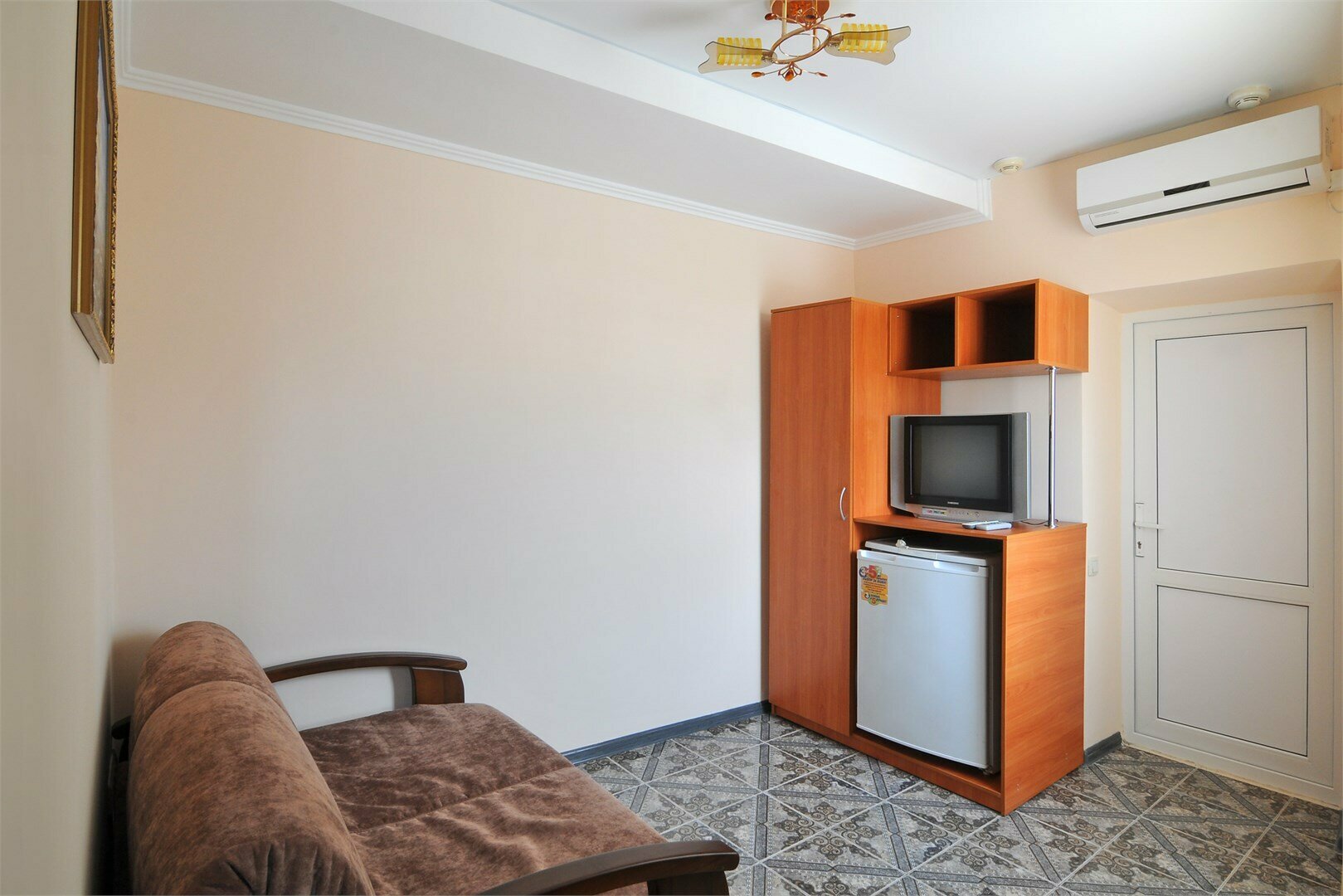 Трехместный номер с балконом